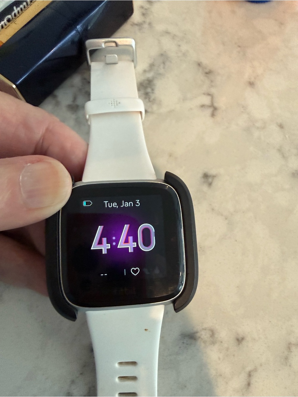 Fitbit White Smartwatch with Black Protective Bumper